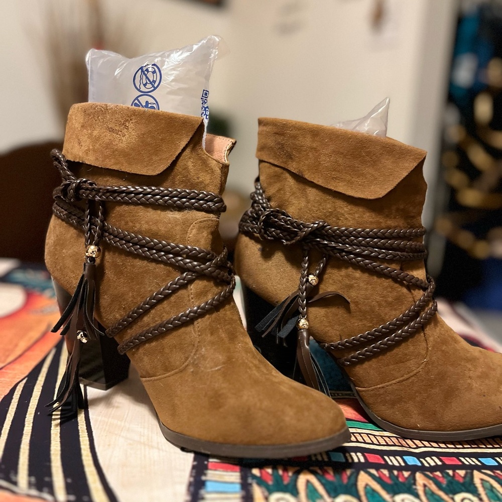 Women suede ankle boots .